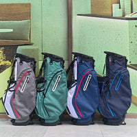 Sac de golf trépied léger 14 compartiments – quatre sacs côte à côte dans les coloris gris, vert, bleu et bleu marine, vue de face