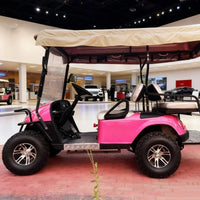 Voiturette de golf électrique multifonction rose – vue de profil en exposition