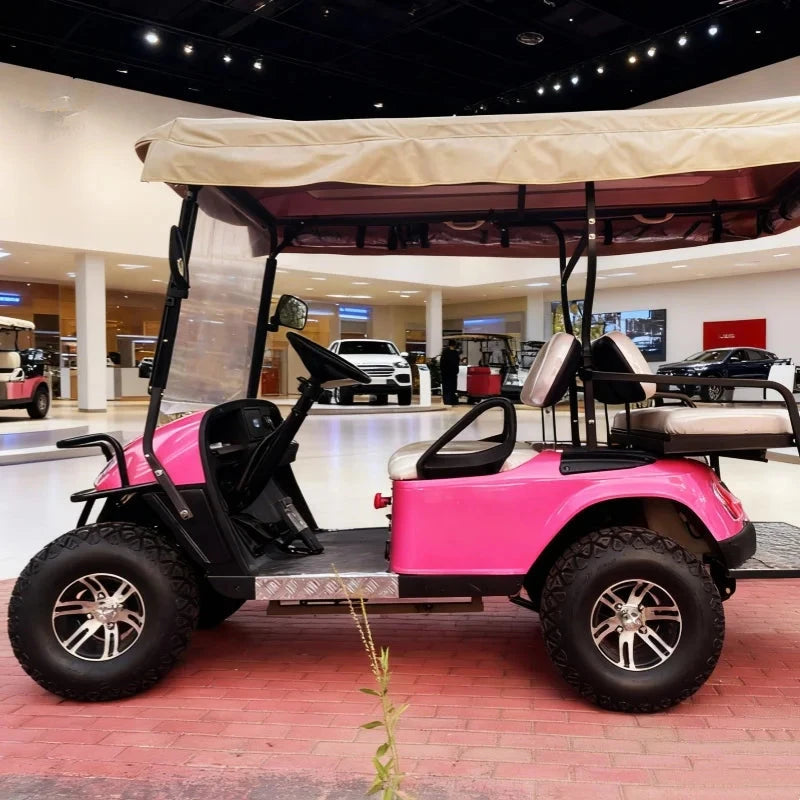 Voiturette de golf électrique multifonction rose – vue de profil en exposition