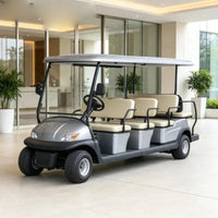 Voiturette de golf 6 places – version grise dans un hall d'accueil