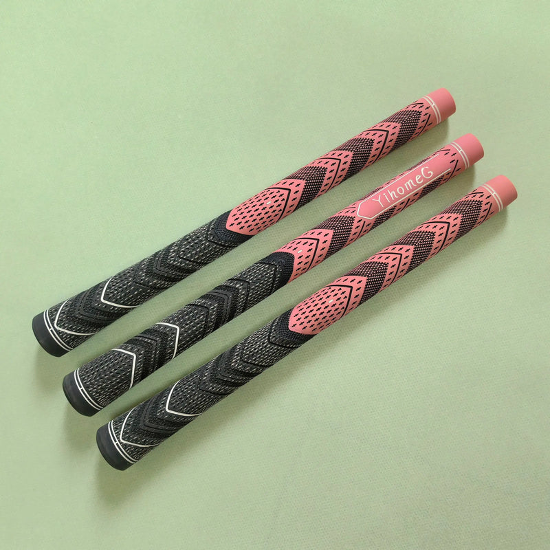 Grips de golf coton et caoutchouc – trois grips alignés avec zone rose centrale