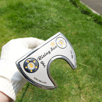 Putter maillet fraisé CNC – tête tenue à la main, vue de dessus