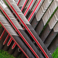 Grips de golf demi-coton – grips à bande rouge sur l'herbe