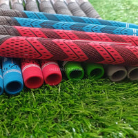Grips de golf multi-composants – grips colorés sur l'herbe, embouts ouverts