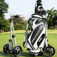 Chariot de golf 2 roues aluminium – chariot replié à côté d'un sac de golf sur le gazon