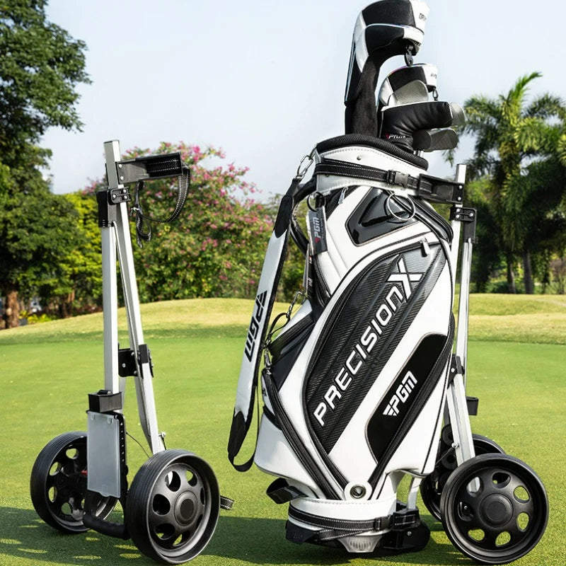 Chariot de golf 2 roues aluminium – chariot replié à côté d'un sac de golf sur le gazon