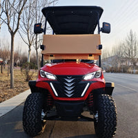Voiturette de golf électrique tout-terrain – vue de face avec calandre et pneus tout-terrain