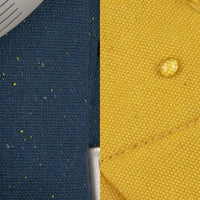 Set de golf complet droitier – détail des tissus bleu marine et jaune du sac