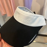 Visière de golf femme à nœud – visière noire, bandeau blanc