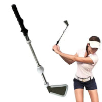 Aide au swing rétractable – golfeuse en haut de backswing avec l'aide au swing