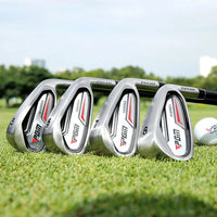 Fer de golf inox – quatre fers alignés sur l'herbe