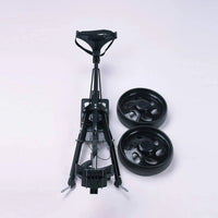 Chariot de golf pliable 2 roues – châssis replié avec les deux roues posées à côté