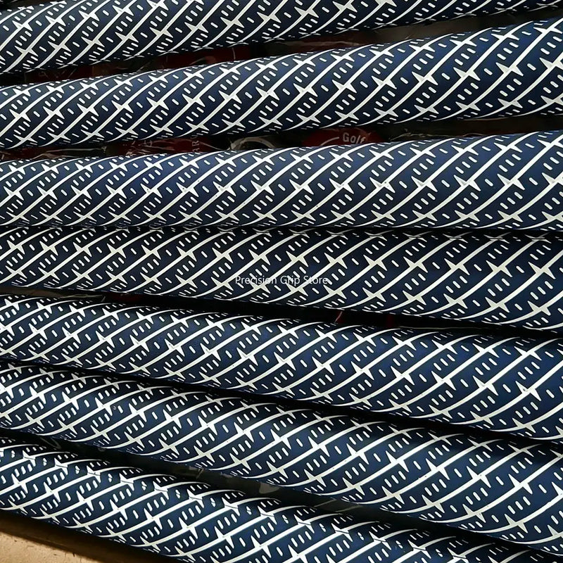 Grips de golf bleu marine et blanc – détail du motif blanc sur un lot de grips