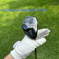 Hybride golf noir – loft 22° tenu à la main sur l'herbe