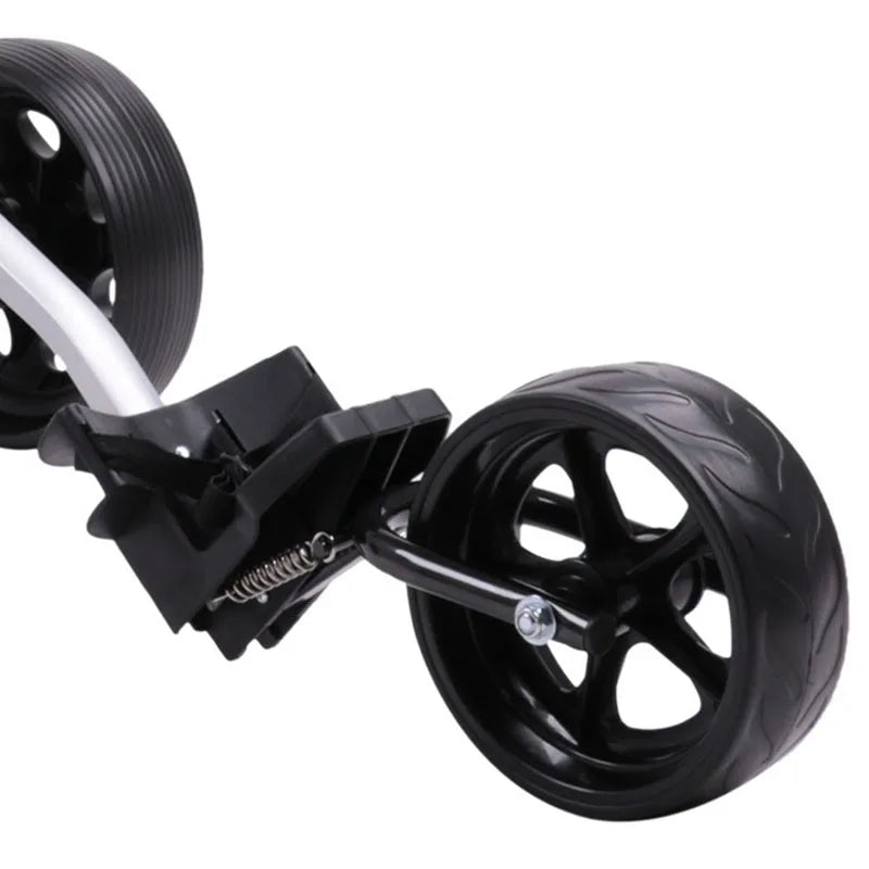 Chariot de golf manuel pliable à 3 roues – gros plan sur une roue et son ressort