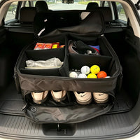 Organisateur de coffre de golf – ouvert dans un coffre avec balles, tenues et chaussures