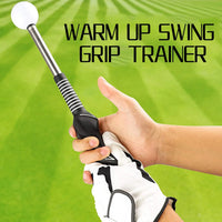 Entraîneur de swing golf télescopique – manche déployé tenu en main avec un gant