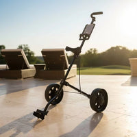 Chariot de golf manuel pliable à 2 roues – vue de trois quarts sur une terrasse