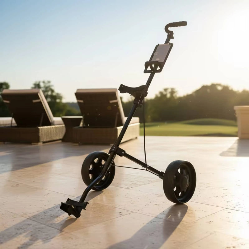 Chariot de golf manuel pliable à 2 roues – vue de trois quarts sur une terrasse